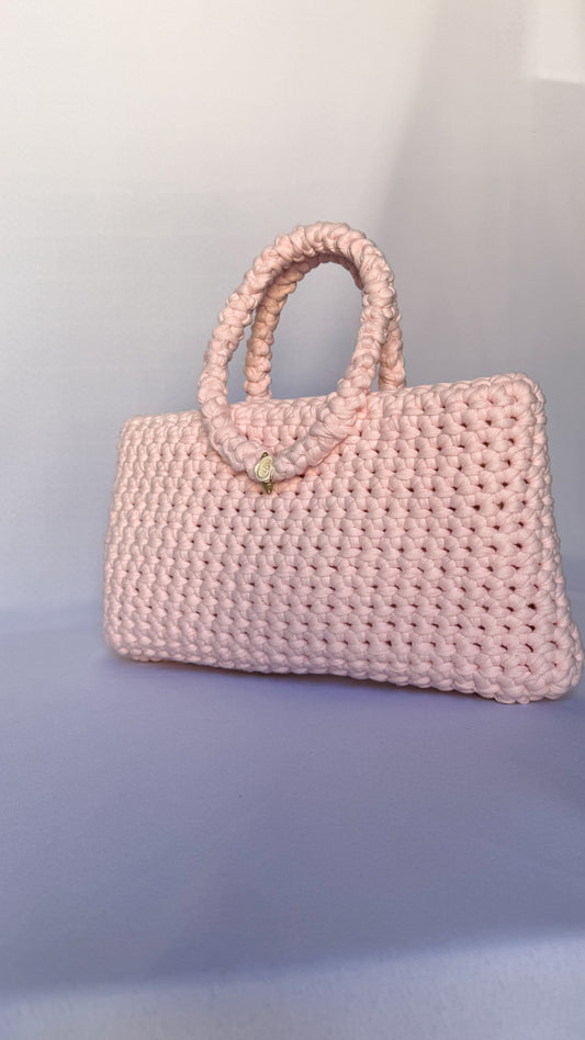 Sac à main en crochet rose